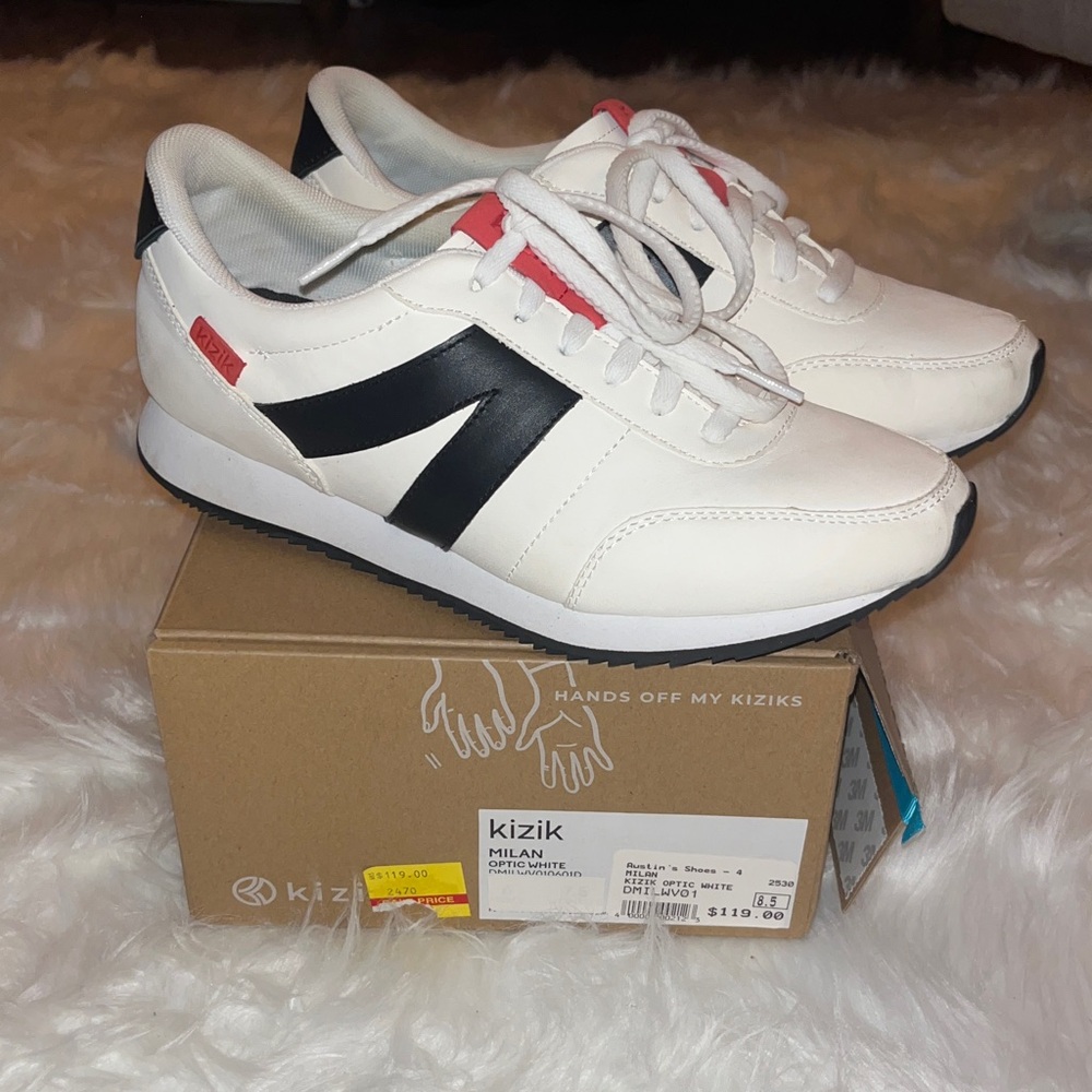 Kizik White and Black Sneakers Only wore twice. Love love these shoes.